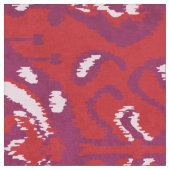 Farbenfrohe rote und lila Tribal-Muster Stoff (Nahaufnahme)