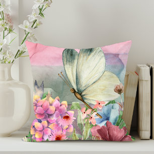 Farbenfrohe Schmetterlingsküsse unter Wildblumen Kissen