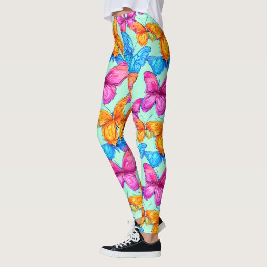 Farbenfrohe Schmetterlingsmuster Leggings (Links)