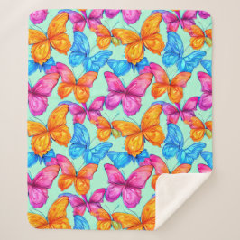 Farbenfrohe Schmetterlingsmuster Sherpadecke