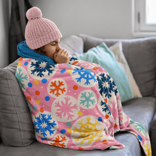 Farbenfrohe Schneeflocken im rosa Urlaubsmuster Fleecedecke