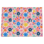 Farbenfrohe Schneeflocken im rosa Urlaubsmuster Große Geschenktüte (Vorderseite)