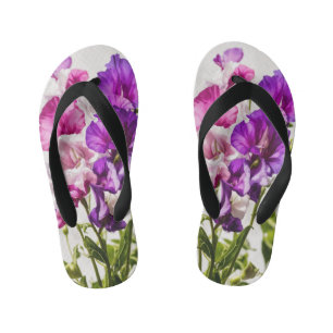 Farbenfrohe Seite von Flip-Flops: Design lebendig Kinderbadesandalen