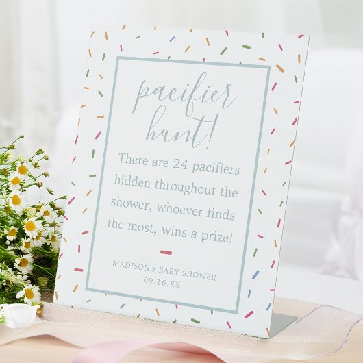 Farbenfrohe Sprinkles Kinderdusche Schnuller Jagds Sockelschild