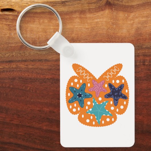 Farbenfrohe Starfische mit orangefarbenem Hintergr Schlüsselanhänger (Vorderseite)