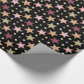 Farbenfrohe Sterne auf schwarz Geschenkpapier (Ecke)