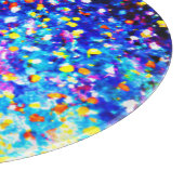 Farbenfrohe Sterne in blauem Himmel. Jetzt kaufen Schneidebrett (Ecke)