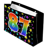 Farbenfrohe Sterne + Regenbogenmuster "87" Event # Große Geschenktüte (Vorderseite Schrägansicht)