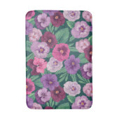 Farbenfrohe Stiefmütterchen auf dunkelgrünblau Badematte (Vorderseite Vertikal)