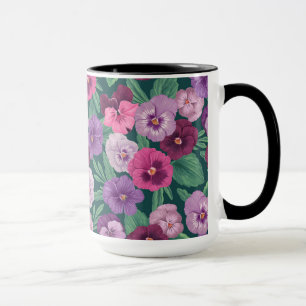 Farbenfrohe Stiefmütterchen auf dunkelgrünblau Tasse