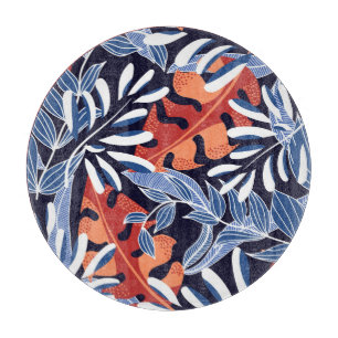 Farbenfrohe tropische Blätter Blauer Hintergrund Schneidebrett