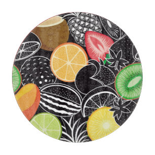 Farbenfrohe tropische Früchte, schwarzer Hintergru Schneidebrett