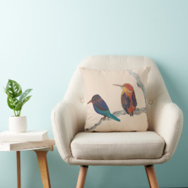 Farbenfrohe Vögel auf einem Kissen mit Rückenwirbe