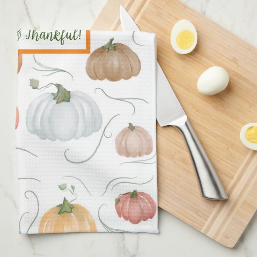 Farbenfrohe Wasserfarbenrebe Kürbispflaster Geschirrtuch (Viertel Falte)