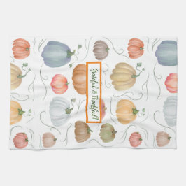 Farbenfrohe Wasserfarbenrebe Kürbispflaster Geschirrtuch