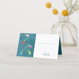 Farbenfrohe Weihnachtsbeleuchtung im blauen Hinter Platzkarte