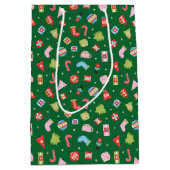 Farbenfrohe Weihnachtsgeschenke über grünes Wrappi Mittlere Geschenktüte (Vorderseite)