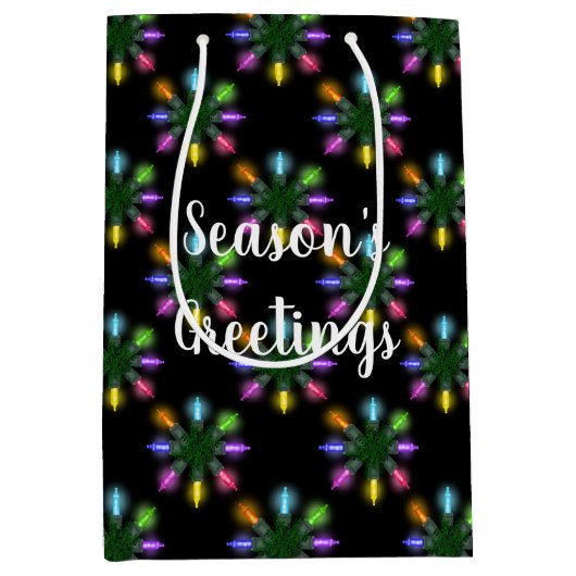 Farbenfrohe Weihnachtslichter Schneeflocke Mittlere Geschenktüte (Vorderseite)