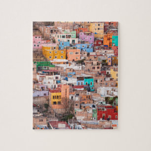 Farbenfrohe Zuhause auf dem Hügel Puzzle