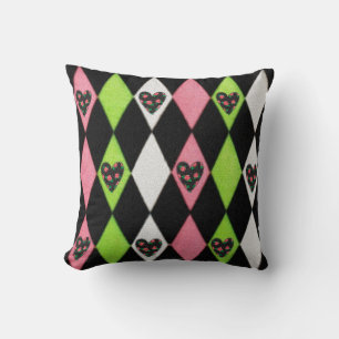 Farbenfroher Harlekin-Druck mit Rosenherzen Kissen