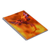 Farbenfroher Phönix fliegt vor einem frischen Hint Notizblock (Rechte Seite)