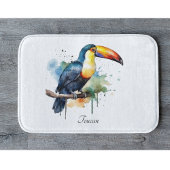 farbenfroher Toukan, der auf einem Ast sitzt Badematte