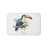 farbenfroher Toukan, der auf einem Ast sitzt Badematte (Vorderseite)