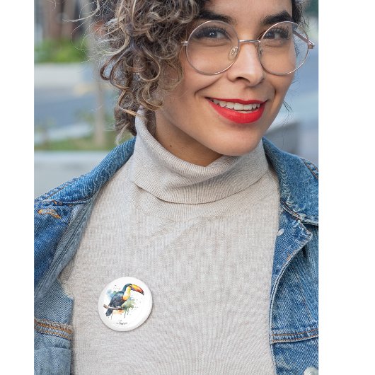 farbenfroher Toukan, der auf einem Ast sitzt Button