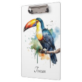 farbenfroher Toukan, der auf einem Ast sitzt Klemmbrett (Links)