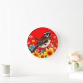 Farbenfroher Vogel unter Blume Runde Wanduhr (Zuhause)