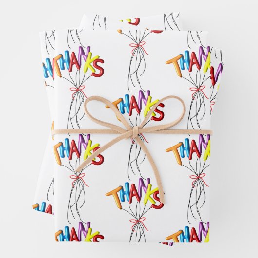 Farbenfrohes "Danke" buchstabiert mit Luftballons Geschenkpapier Set (Beispiel)