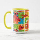 Farbenfrohes Elmo-Rastermuster Tasse (Links)