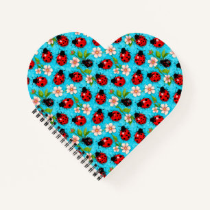 Farbenfrohes Marienkäfermuster mit Blumen Notizblock