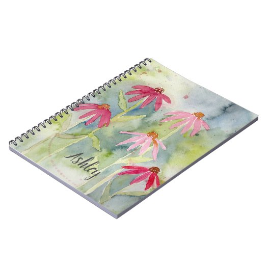 Farbfernseher mit rosafarbenem Notebook Notizblock (Linke Seite)