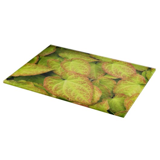 Farbige Barrenwort-Pflanze Blätter Schneidebrett (Ecke)