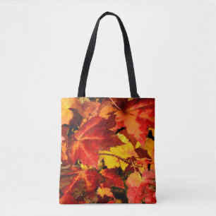 Farbige Blätter im Herbst, goldfarbenes orangefarb Tasche