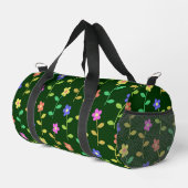 Farbige Blume, grüner Hintergrund, schwarz Duffle Bag (Rechte Ecke)