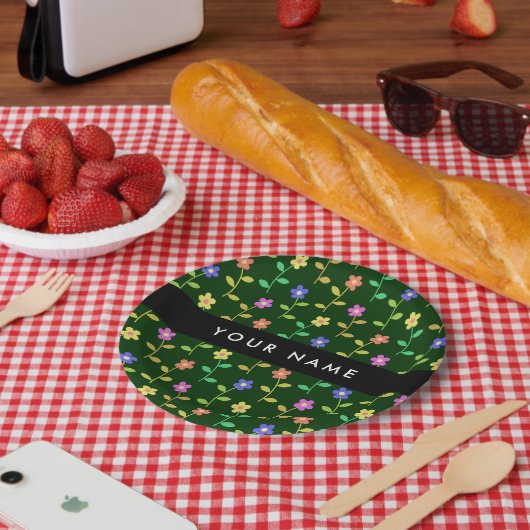 Farbige Blume, grüner Hintergrund, schwarz Pappteller (Picknick)