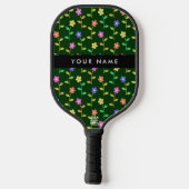 Farbige Blume, grüner Hintergrund, schwarz Pickleball Schläger (Rückseite)