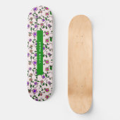 Farbige Blume, rosa Hintergrund, grün Skateboard (Vorderseite)