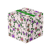 Farbige Blume, rosa Hintergrund, grün Würfel (Rückseite Schrägansicht)