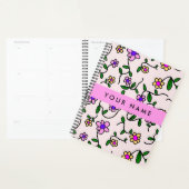 Farbige Blume, rosa Hintergrund, rosa Planer (Anzeige)