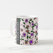 Farbige Blume, rosa Hintergrund, schwarz Kaffeetasse (Vorderseite Links)