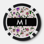 Farbige Blume, rosa Hintergrund, schwarz Pokerchips (Rückseite)
