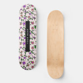 Farbige Blume, rosa Hintergrund, schwarz Skateboard (Vorderseite)