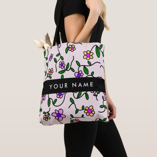Farbige Blume, rosa Hintergrund, schwarz Tasche (Von Nahem)