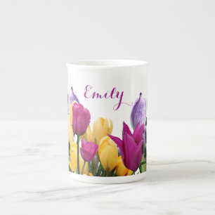 Farbige Frühlingsblumen mit dem Namen "Emily" Porzellantasse