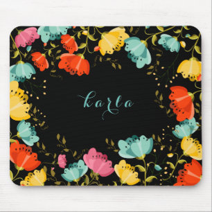Farbige Frühlingsblumen rahmen schwarzen Hintergru Mousepad