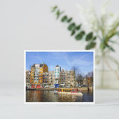 Farbige Grachtenhäuser und Boot in Amsterdam Postkarte (Stehend Vorderseite)