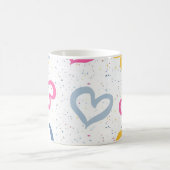 Farbige Herzchen und gesprenkelter Kaffeebecher mi Kaffeetasse (Mittel)